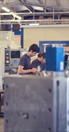 Technicians realise injection moulds in the machine shop